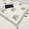 Minimal Off-White Linen Saree with Traditional Elephant Motif & Tribal Border