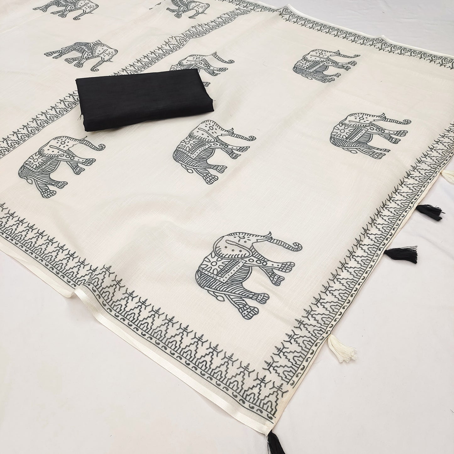 Minimal Off-White Linen Saree with Traditional Elephant Motif & Tribal Border
