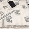 Minimal Off-White Linen Saree with Traditional Elephant Motif & Tribal Border
