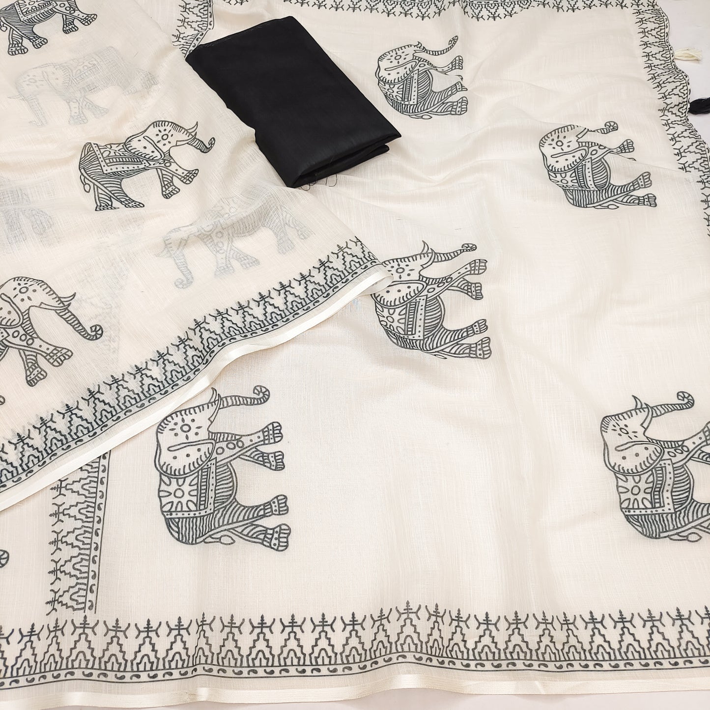 Minimal Off-White Linen Saree with Traditional Elephant Motif & Tribal Border