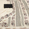 Graceful Off-White Linen Saree with Royal Elephant & Umbrella Motif Stripes