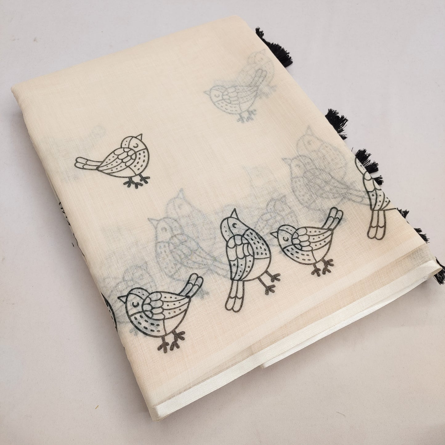 Graceful Off-White Linen Saree with Minimalist Bird Border Design