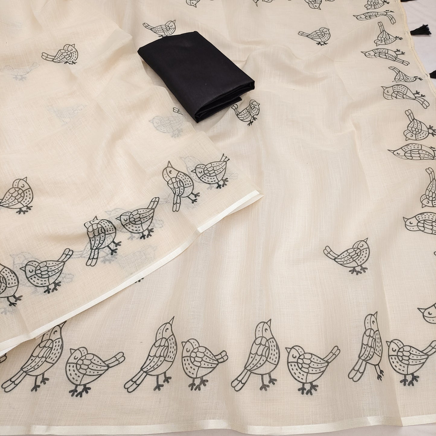 Graceful Off-White Linen Saree with Minimalist Bird Border Design