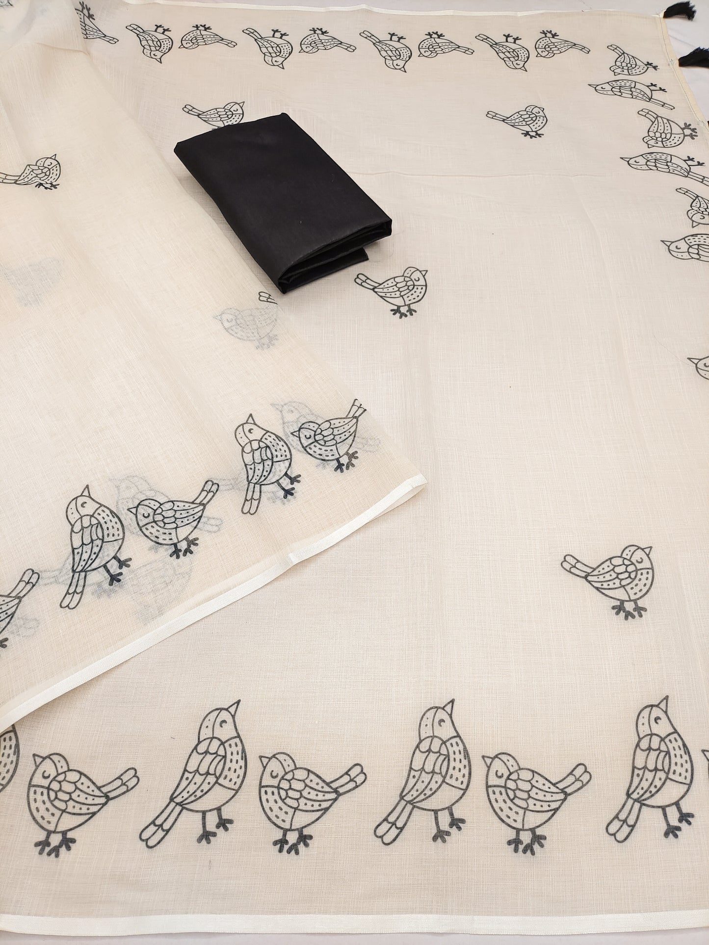 Graceful Off-White Linen Saree with Minimalist Bird Border Design