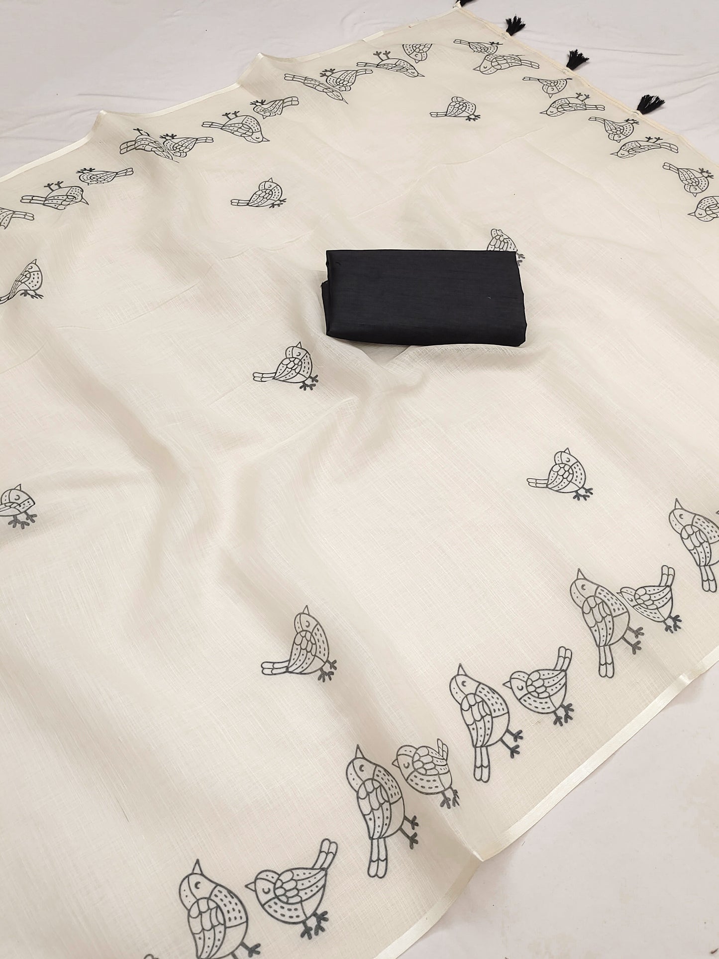 Graceful Off-White Linen Saree with Minimalist Bird Border Design