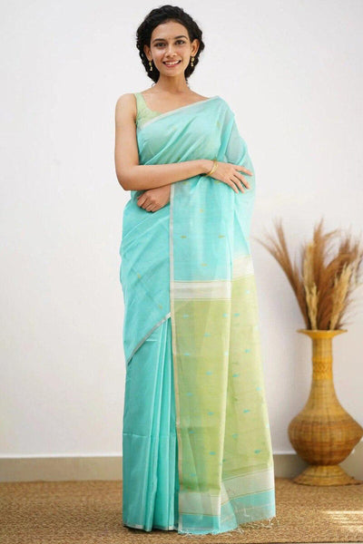 Mellifluous Sea Green Cotton Silk Saree With Staggering Blouse Piece