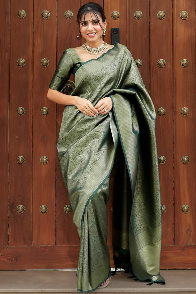 Blissful Dark Green Soft Silk Saree With Sizzling Blouse Piece