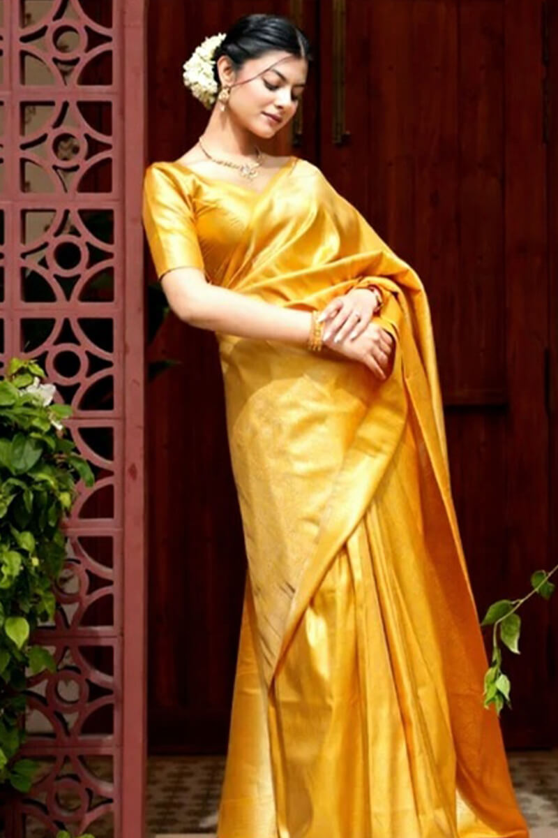 Embrocation Yellow Soft Silk Saree With Aplomb Blouse Piece