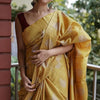 Exquisite Mustard Linen Silk Saree With Transcendent Blouse Piece