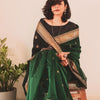 Snazzy Dark Green Linen Silk Saree With Glittering Blouse Piece