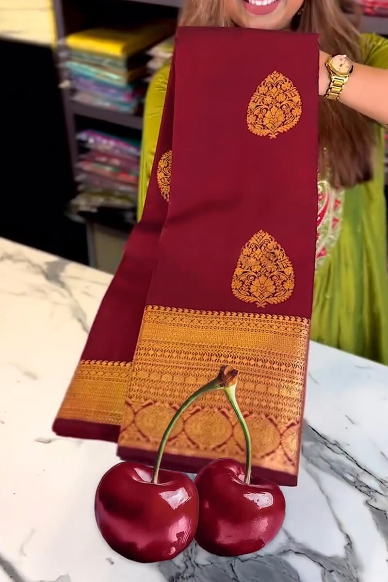 Inimitable Wine Soft Banarasi Silk Saree With Evocative Blouse Piece