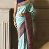 Enigmatic Firozi Soft Silk Saree With Glittering Blouse Piece