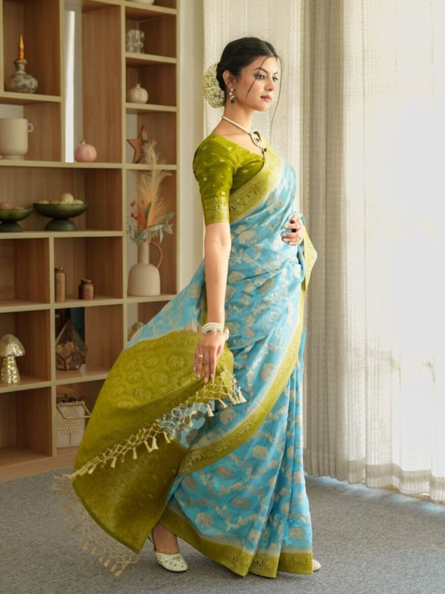 Devastating Sky Soft Silk Saree With Glamorous Blouse Piece