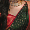 Conflate Dark Green Soft Silk Saree With Majesty Blouse Piece