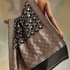 Flaunt Black Soft Silk Saree With Radiant Blouse Piece