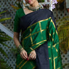 Alluring Dark Green Soft Silk Saree With Entrancing Blouse Piece
