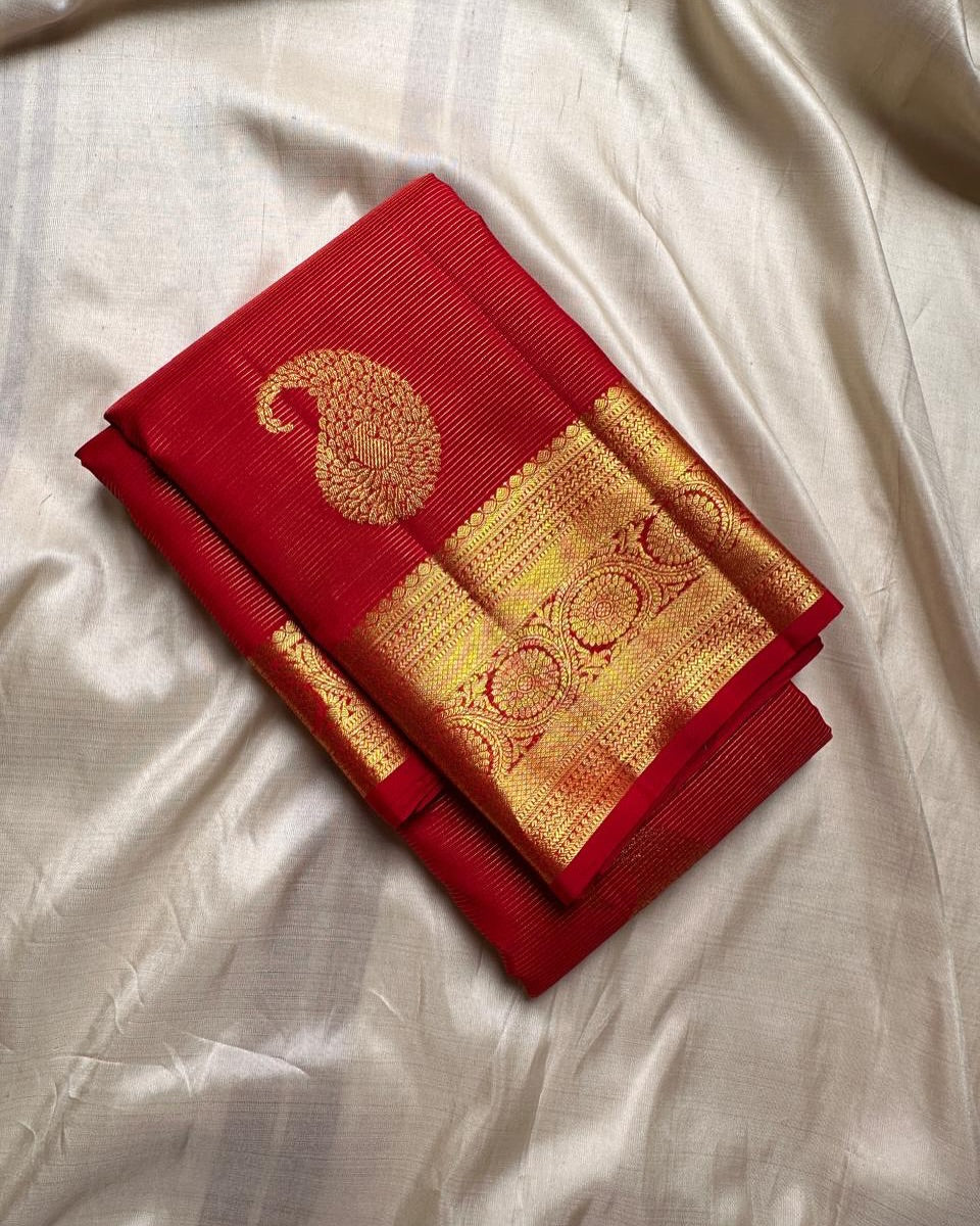 Twirling Red Soft Banarasi Silk Saree With Beauteous Blouse Piece