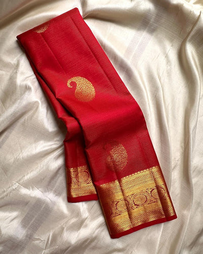 Twirling Red Soft Banarasi Silk Saree With Beauteous Blouse Piece
