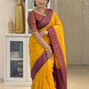 Adorning Yellow Soft Silk Saree With Unique Blouse Piece