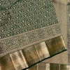 Eloquence Dark Green Soft Banarasi Silk Saree With Engrossing Blouse Piece