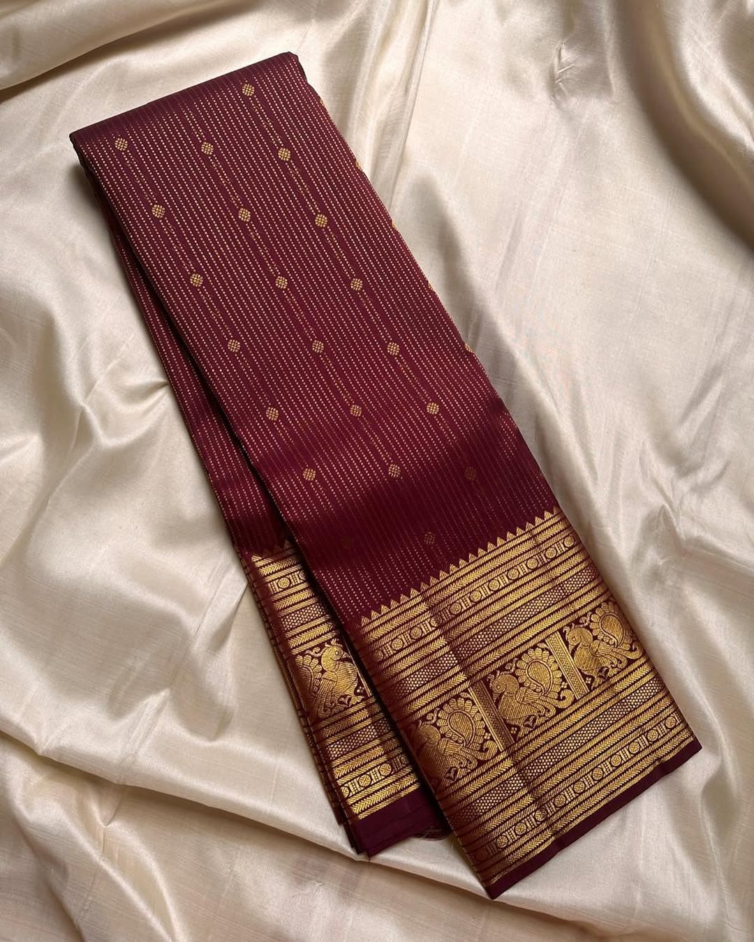 Hypnotic Maroon Soft Banarasi Silk Saree With Inimitable Blouse Piece