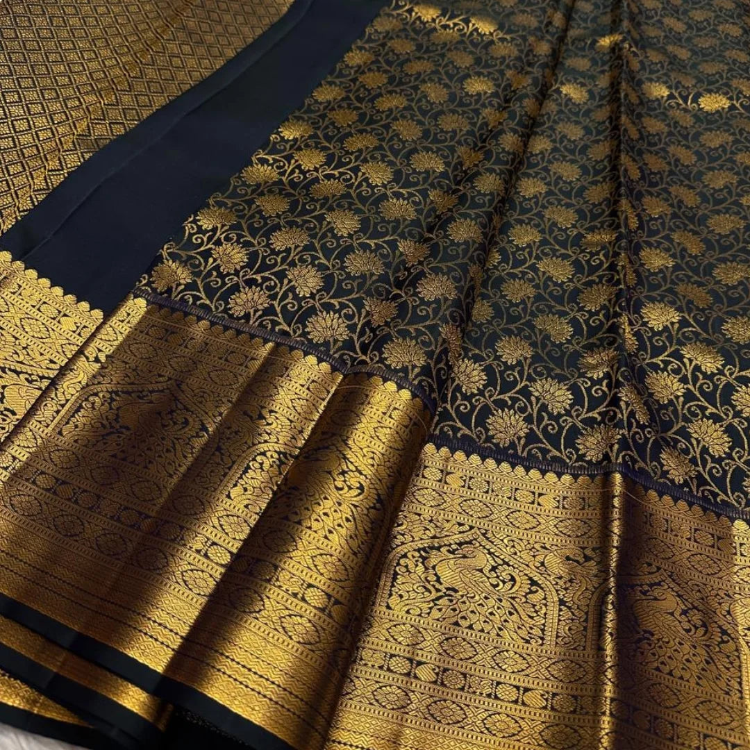 Divine Black Soft Banarasi Silk Saree With Delightful Blouse Piece