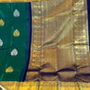 Eloquence Dark Green Soft Banarasi Silk Saree With Ineffable Blouse Piece