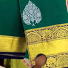 Eloquence Dark Green Soft Banarasi Silk Saree With Ineffable Blouse Piece