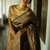 Captivating Green Soft Silk Saree With Twirling Blouse Piece