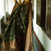 Captivating Green Soft Silk Saree With Twirling Blouse Piece