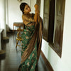 Captivating Green Soft Silk Saree With Twirling Blouse Piece