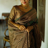 Captivating Green Soft Silk Saree With Twirling Blouse Piece