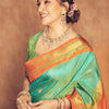 Exuberant Firozi Soft Silk Saree With Surreptitious Blouse Piece