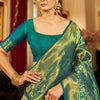 Demure Rama Kanjivaram Silk Saree With Evocative Blouse Piece