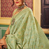 Magnetic Pista Soft Banarasi Silk Saree With Propinquity Blouse Piece