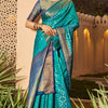 Mesmerising Firozi Patola Silk Saree with Precious Blouse Piece