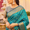 Mesmerising Firozi Patola Silk Saree with Precious Blouse Piece