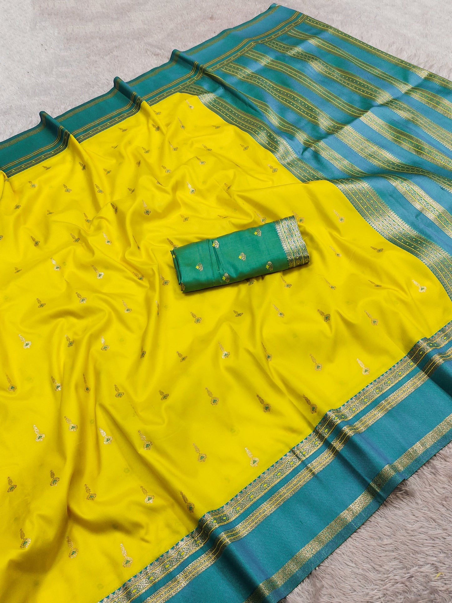 Bright Yellow Silk Saree with Gold Butta & Teal Blue Zari Striped Pallu