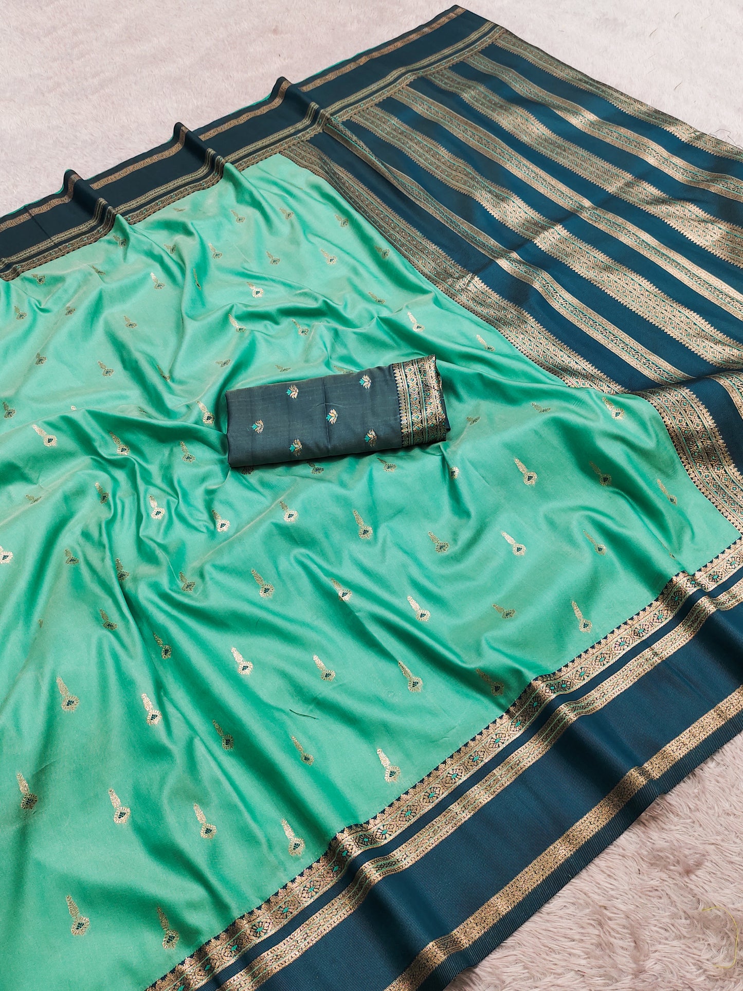 Mint Green Silk Saree with Gold Butta & Teal Blue Zari Striped Pallu