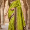 Parrot Green Silk Saree with Gold Butta & Wine Purple Striped Pallu