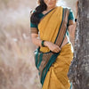Inspiring Mustard Soft Silk Saree With Verdant Blouse Piece