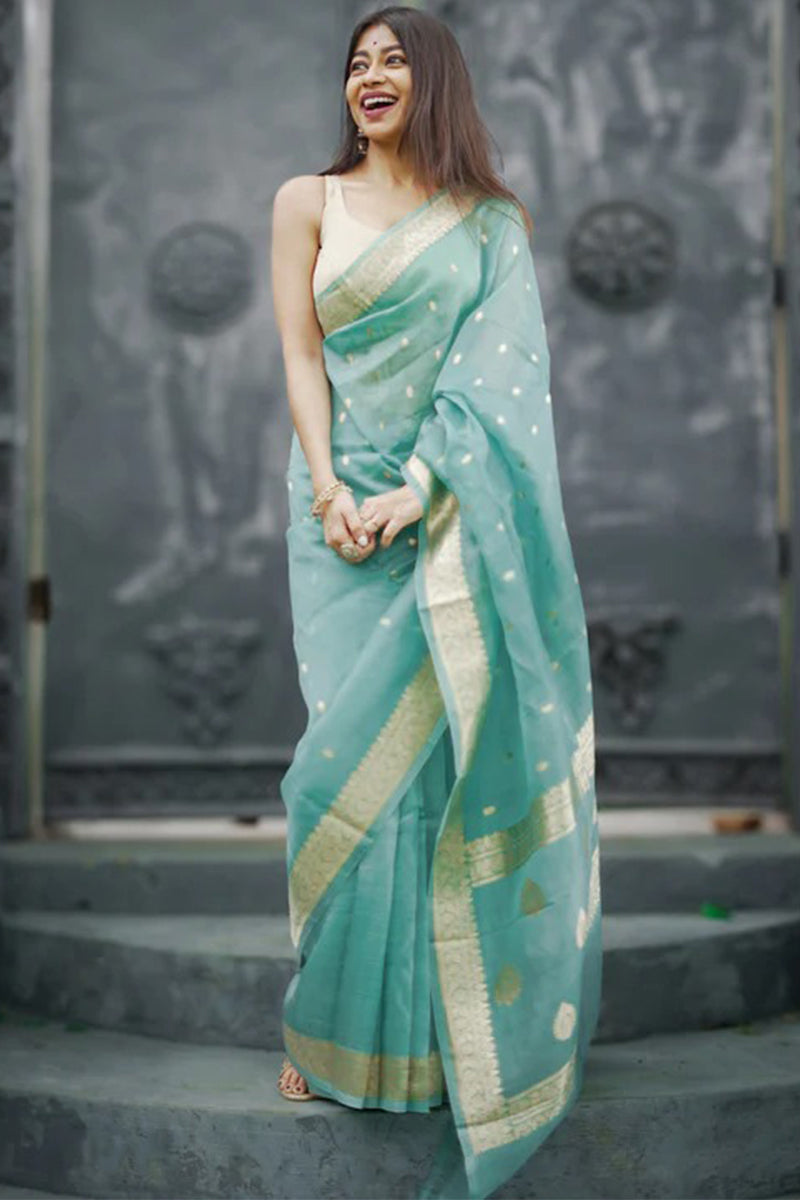 Moiety Turquoise Banarasi Silk Saree With Panoply Blouse Piece