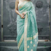 Moiety Turquoise Banarasi Silk Saree With Panoply Blouse Piece