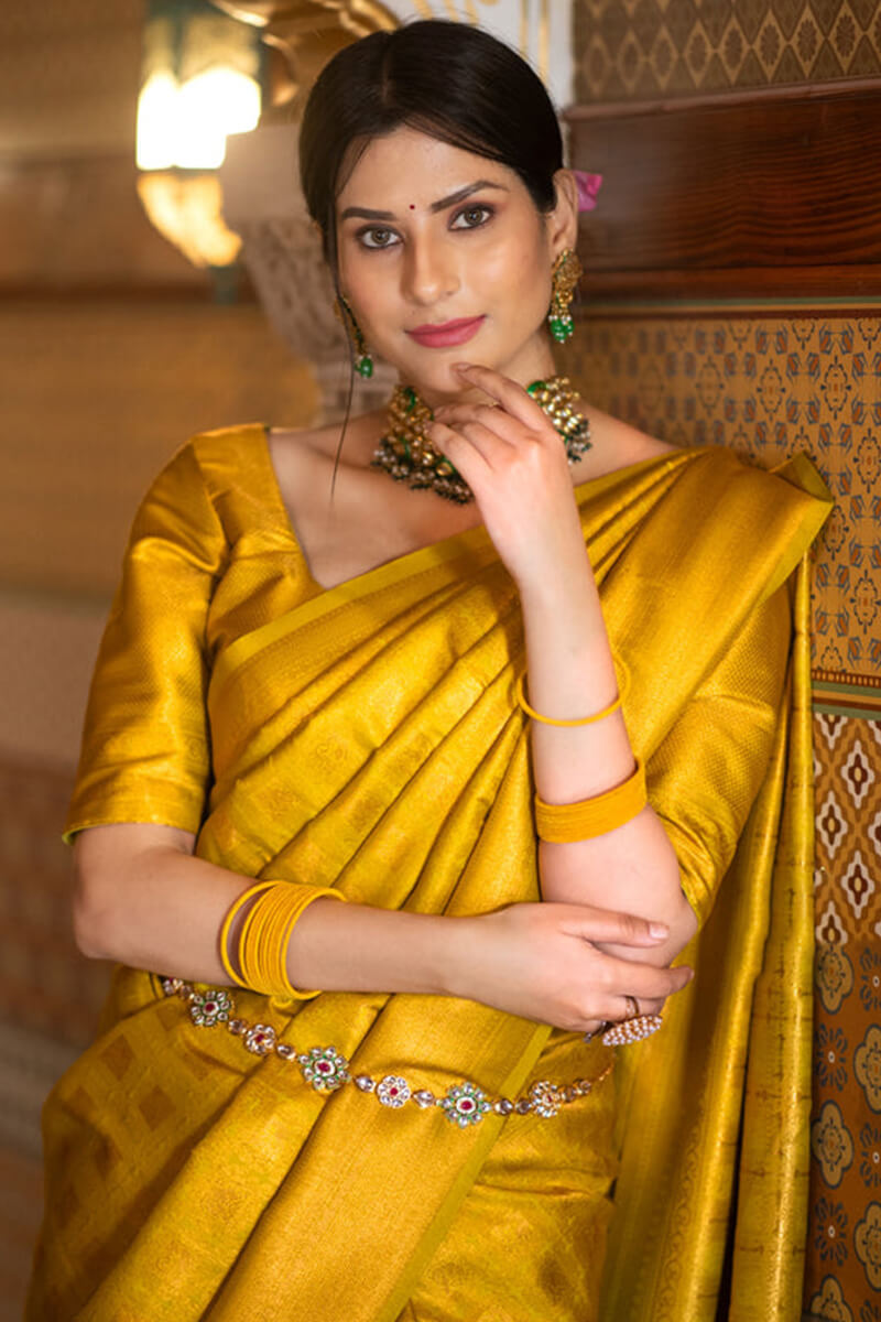 Impressive Yellow Soft Silk Saree With Chatoyant Blouse Piece