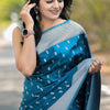 Adoring Teal Blue Cotton Silk Saree With Divine Blouse Piece
