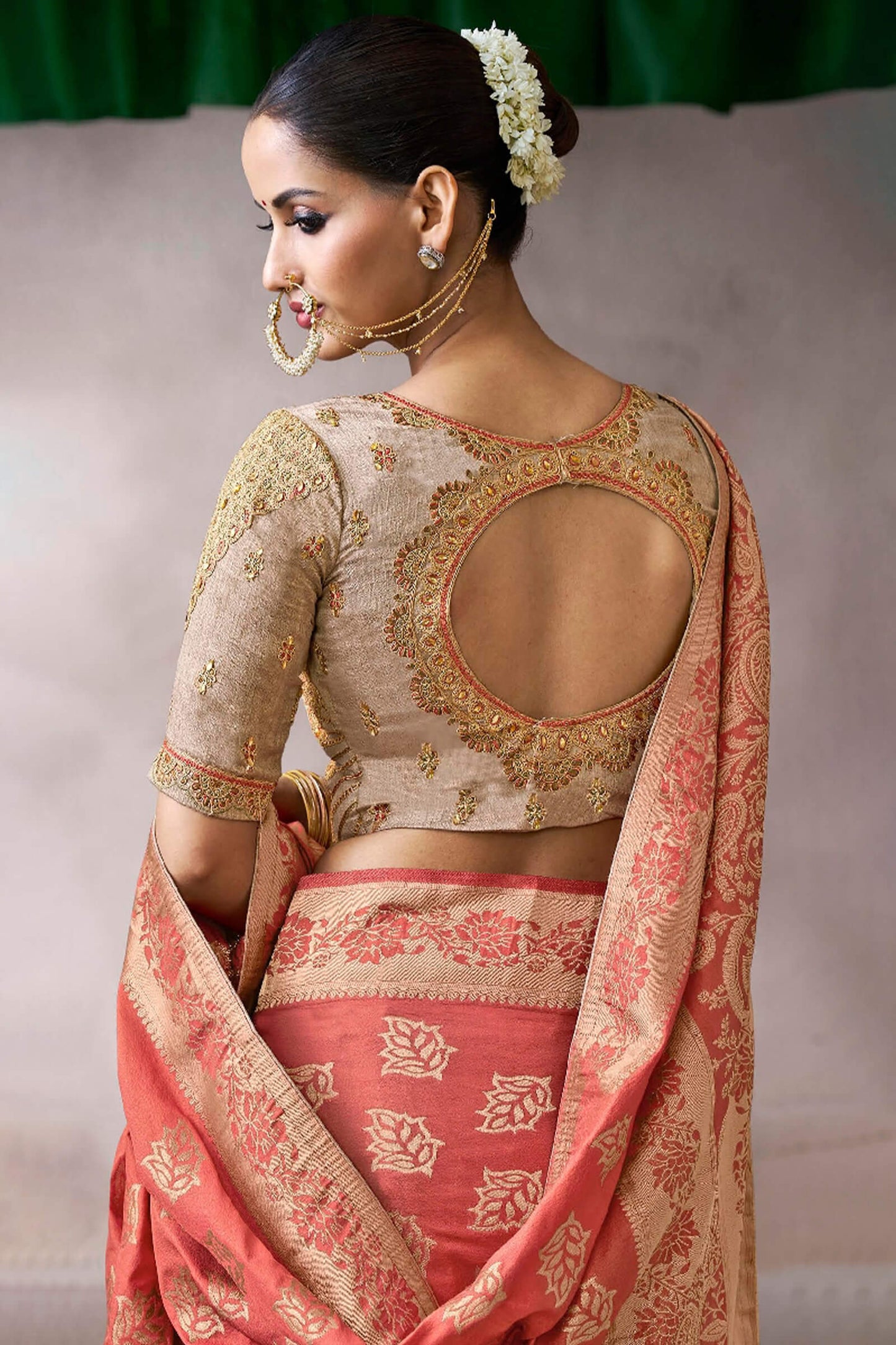 Pulsating Peach Banarasi Satin Silk Saree With Demure Blouse