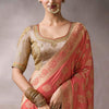 Pulsating Peach Banarasi Satin Silk Saree With Demure Blouse