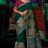 Engrossing Dark Green Banarasi Satin Silk Saree With Gossamer Blouse