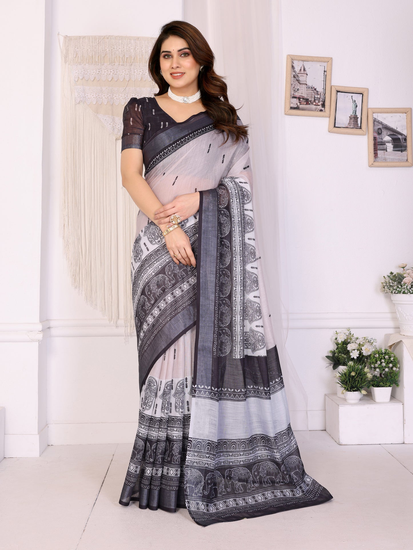 Ivory Mist Linen Cotton Saree with Classic Black Elephant Heritage Border
