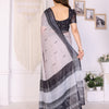 Ivory Mist Linen Cotton Saree with Classic Black Elephant Heritage Border